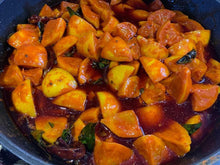 Load image into Gallery viewer, Banu's Lemon Pickle being made in a pot